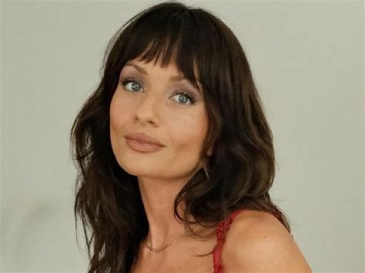 Grace Palmer Shares Swimsuit Photo as She "Met a Puppy"